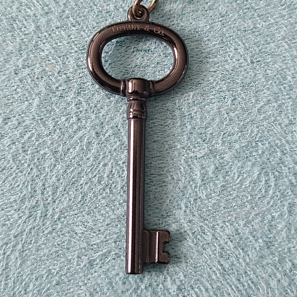 Tiffany Midnight Titanium Oval Key Pendant